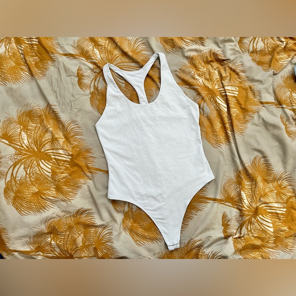 nwot Babaton Contour Racer Bodysuit L pale blue